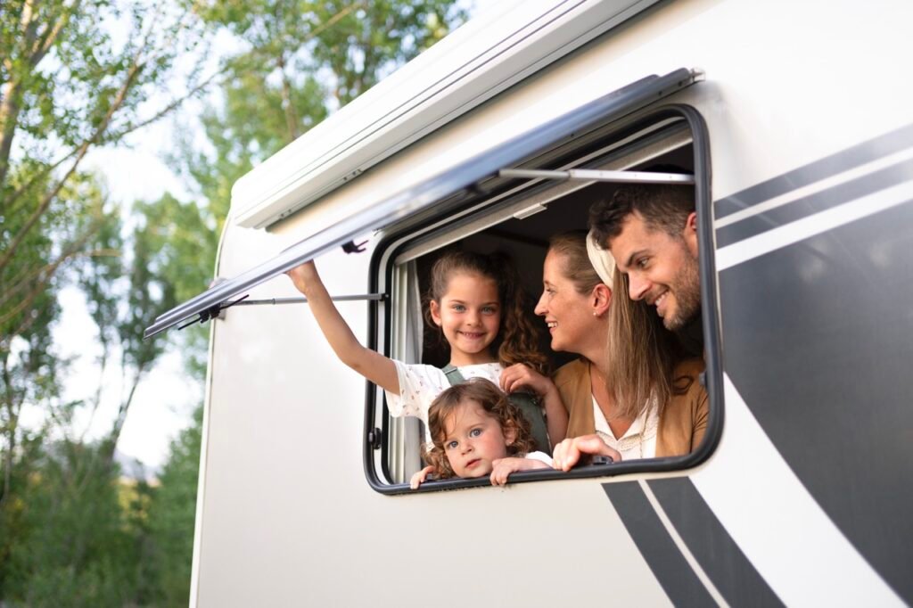 nomad family having fun together trailer caravan best EVs for towing 2025